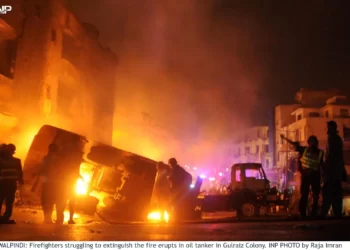 Oil Tanker carrying fuel overturns and catches fire at old Airport road, Rawalpindi