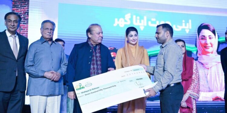 Nawaz, Maryam distribute checks among Apni Chhat Apna Ghar recipients